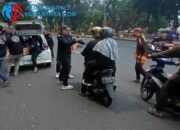Sasar Pengguna Jalan, DPD YALPK Surabaya Tebar 1.000 Paket Buka Puasa di Jalan Genteng