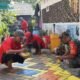 Wujud Nyata Gotong Royong, Babinsa Koramil Kota Gresik Bersama Warga Sulap Kampung Pancasila Sukorame Jadi Estetik